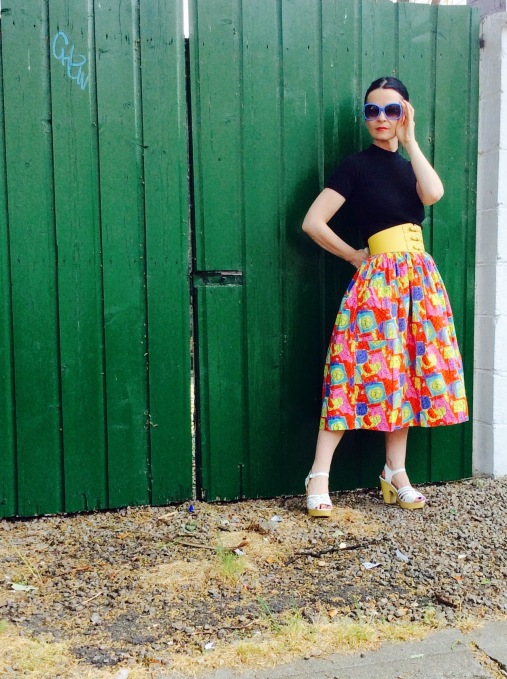 I've worn this fab Vintage Skirt with a black crew neck sweater for an edgy feel!